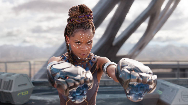 Shuri wielding her weapons in Black Panther