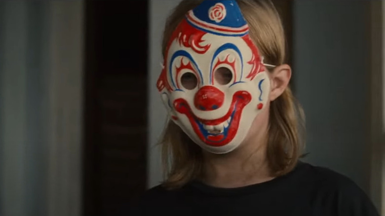 Young Michael Myers wearing mask