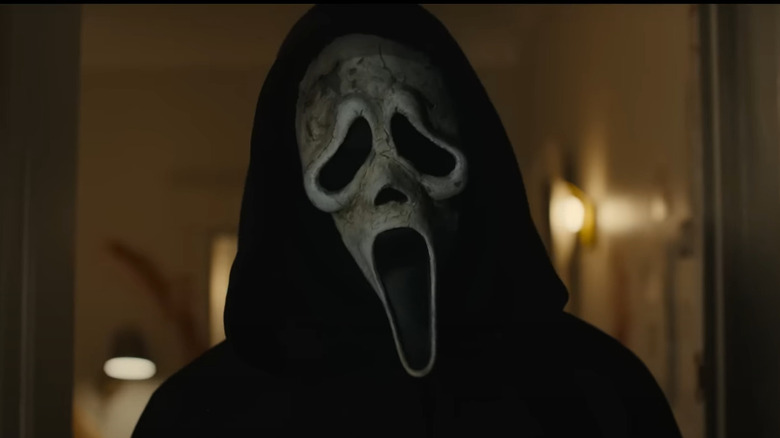 Ghostface standing in doorway