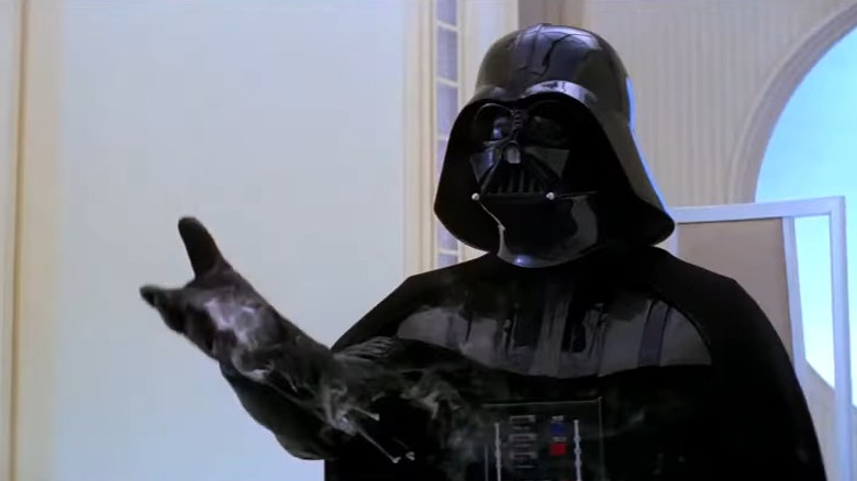 Darth Vader extending his left hand