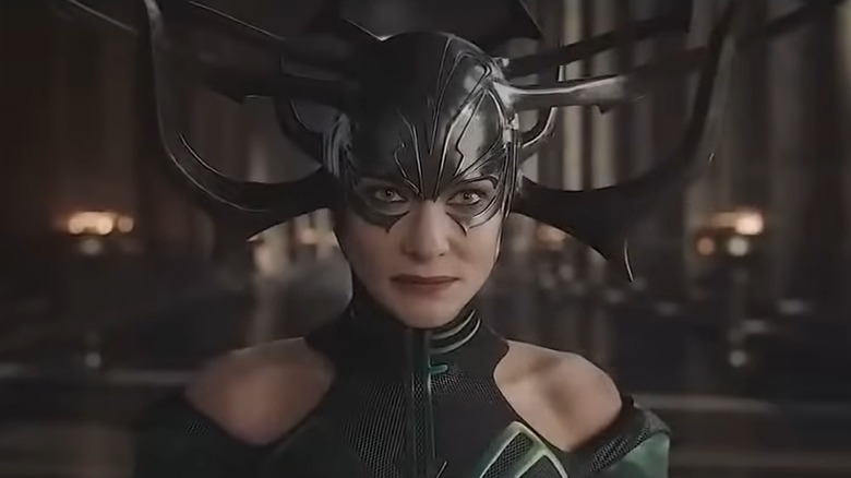 Hela wearing her helmet and staring sternly