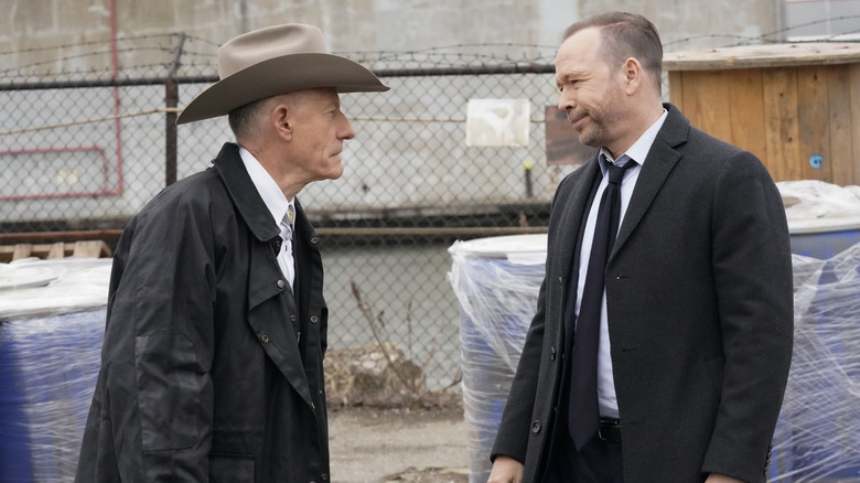 Donnie Wahlberg's Danny staring down a man in a cowboy hat in the Blue Bloods episode Fog of War