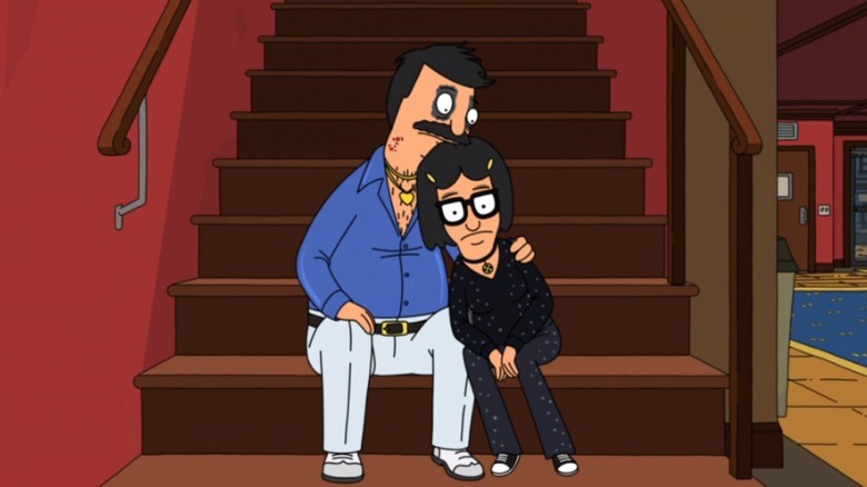 Bob comforts Tina in costumes