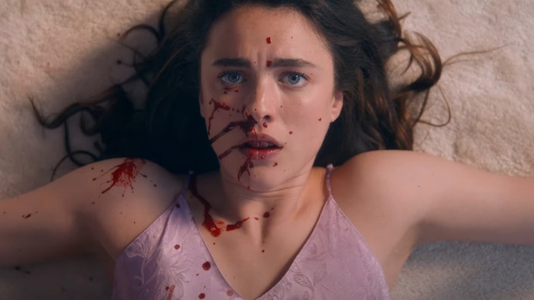 Margaret Qualley is splattered with blood as Sue in The Substance