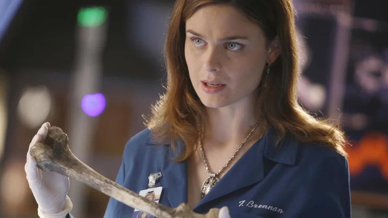 Emily Deschanel's Temperance Brennan holding a bone on Bones