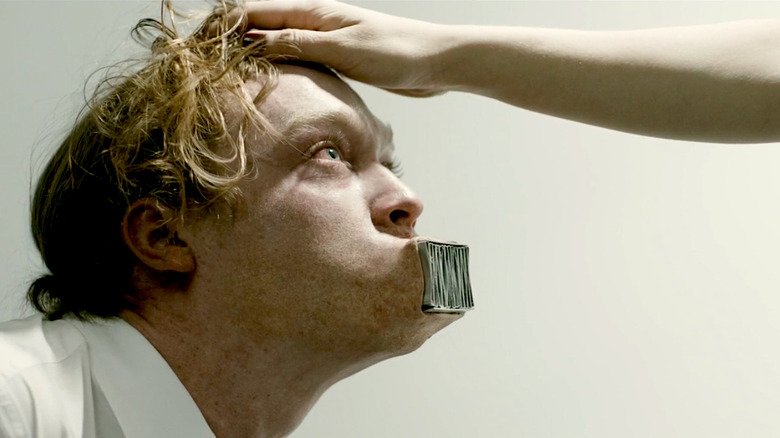 Caleb Landry Jones' mouth turns into a vent in Antiviral