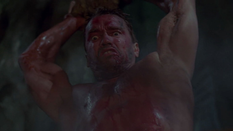 Arnold Schwarzenegger bloody and ready to kill in Predator