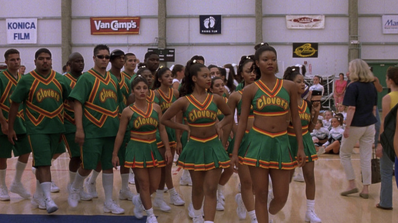 Bring It On Clovers walking through gym