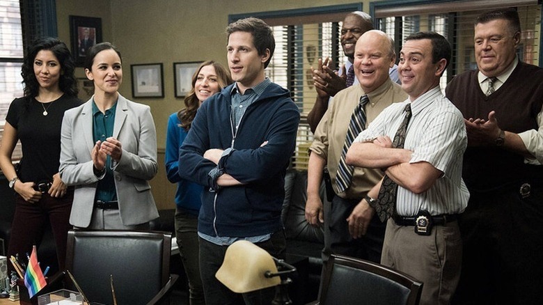 Rosa Amy Gina Jake Terry Scully Boyle and Hitchcock looking excited on Brooklyn Nine-Nine