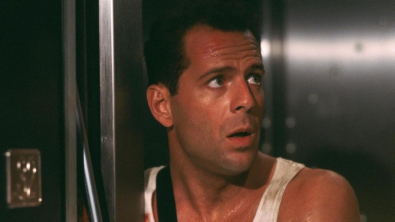 John McClane on a plane in Die Hard