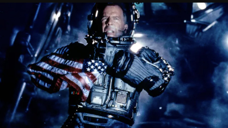 Harry Stamper wields an American flag in Armageddon