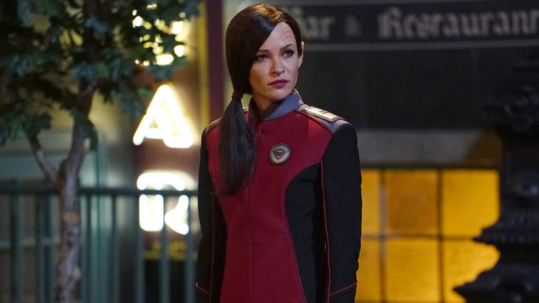 Jessica Szhor as Talla in her red uniform in The Orville episode Defelctors