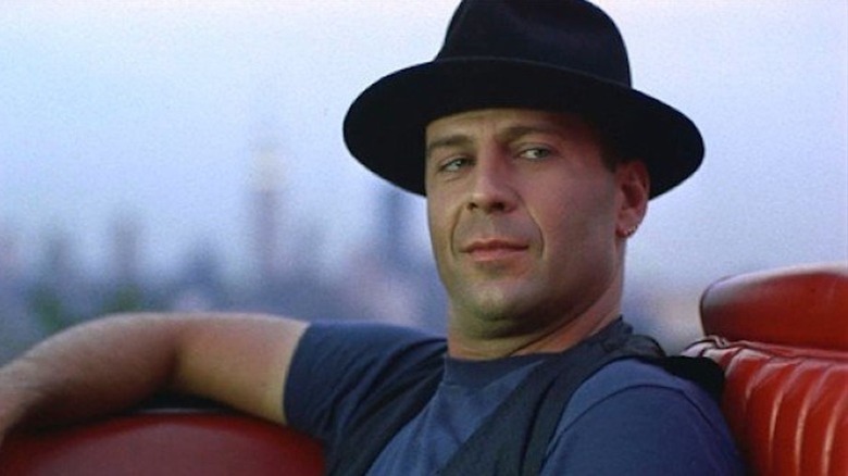 Bruce Willis smashes that million dollar smirk in Hudson Hawk