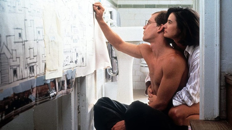 Demi Moore holding Woody Harrelson Indecent Proposal