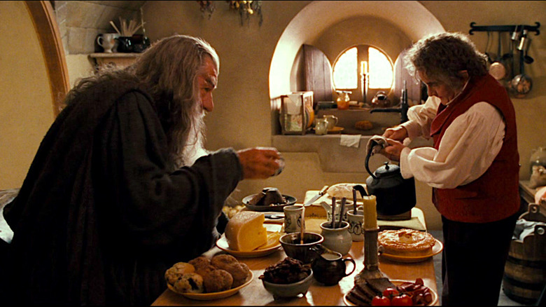 Bilbo serves Gandalf tea