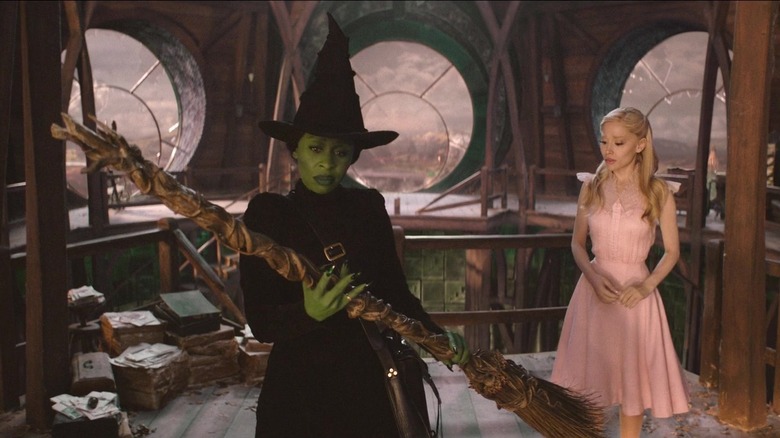 Elphaba holding her broomstick in Wicked