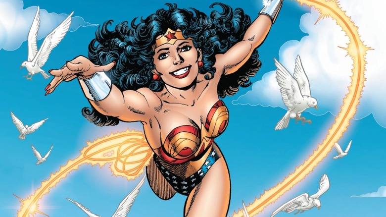 Wonder Woman by George Perez Volume 2 cover showing Diana flying high along with doves