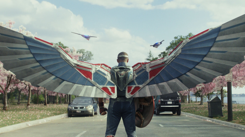 Anthony Mackie as Sam Wilson suited up and with wings outstretched in Captain America: Brave New World