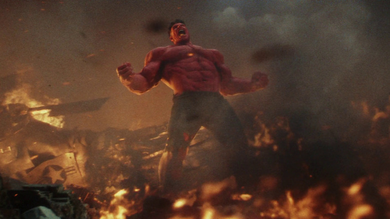 Red Hulk roaring in a field of fiery debris in Captain America: Brave New World