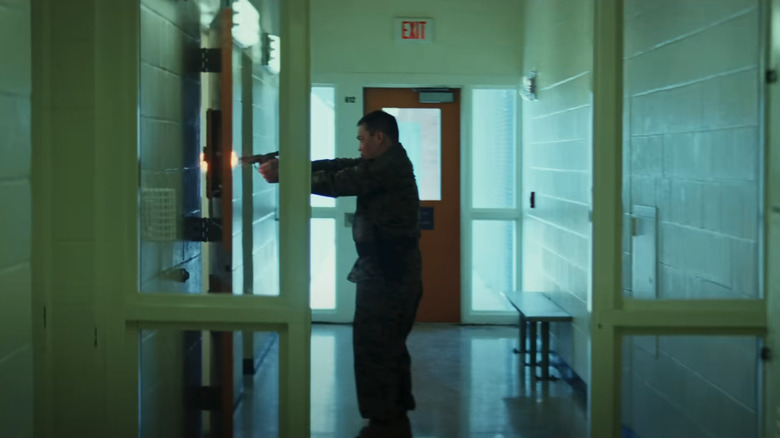 A soldier shoots into a jail cell in Captain America: Brave New World