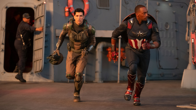 Danny Ramirez as Joaquin Torres and Anthony Mackie as Sam Wilson suited up and running into action in Captain America: Brave New World