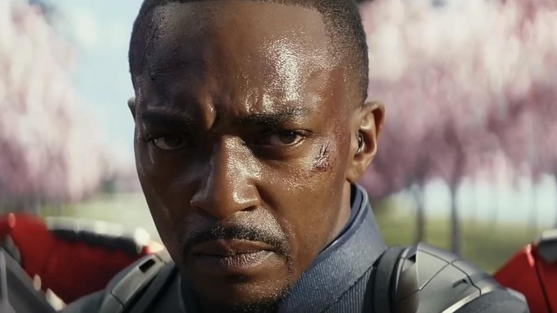 Sam Wilson staring intensely, his face covered in sweat, in Captain America: Brave New World