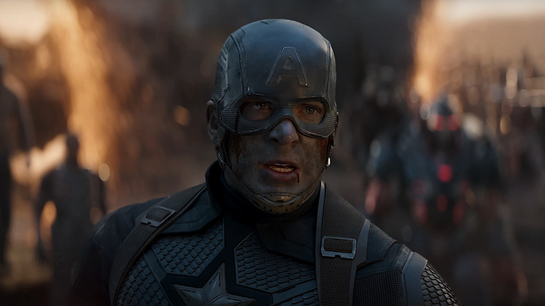 Chris Evans Captain America stands bruised during the final fight with Thanos in Avengers Endgame