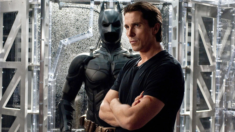 Christian Bale and Batsuit in Dark Knight Rises