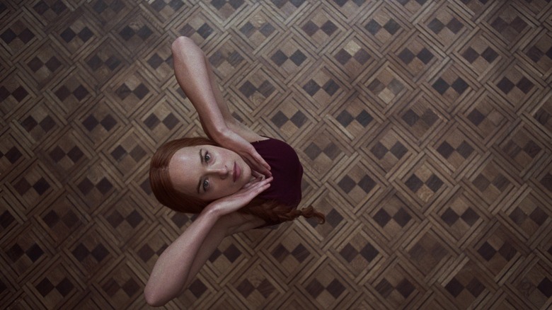 Susie dancing looking up at camera Suspiria 2018