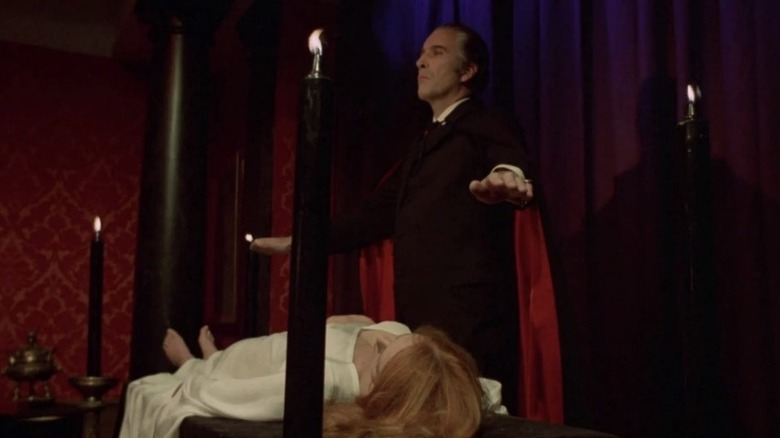 Christopher Lee as Dracula performing a rite in The Satanic Rites of Dracula