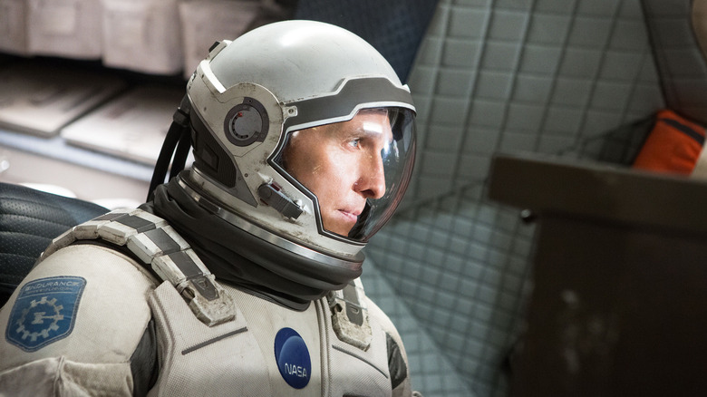 Matthew McConaughey as Cooper in his space suit in Interstellar