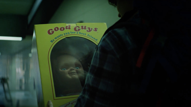 Jake holding a Good Guy Box in Chucky