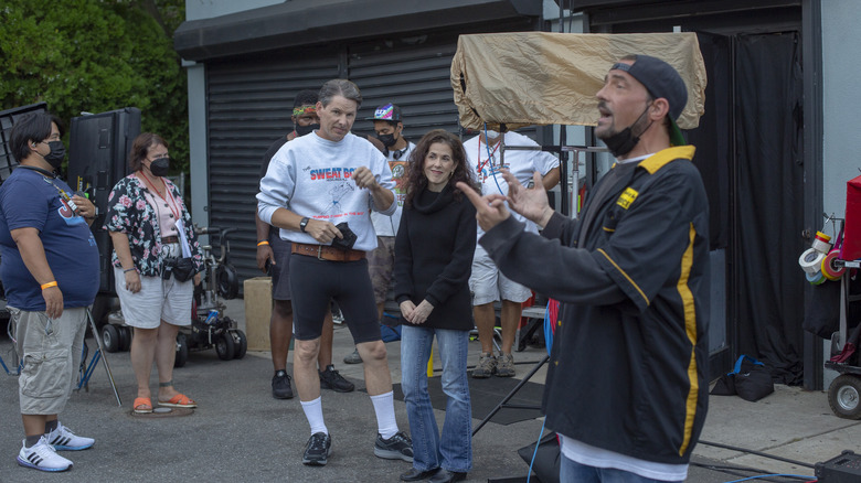 Kevin Smith addresses his crew in a behind the scenes shot from Clerks III