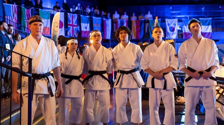 William Zabka as Johnny Lawrence with Miyagi-Do students on Cobra Kai