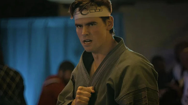 Patrick Luwis' Axel Kovačević wearing captain's headband on Cobra Kai