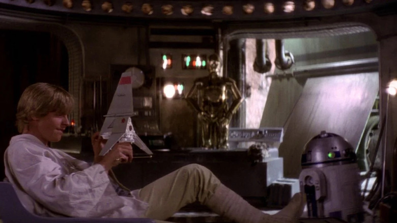 Luke Skywalker plays with a T16 model created by Colin Cantwell in Star Wars: A New Hope