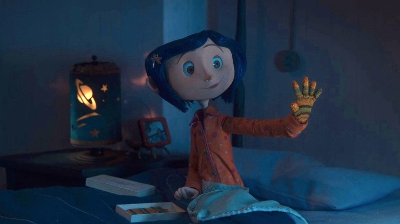 Coraline wearing new gloves