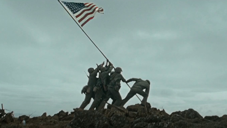 Soldiers raise the flag at Iwo Jima