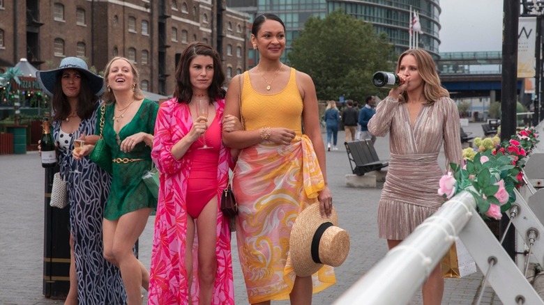 Cynthia Addai-Robinson and Kristen Bell (and cast) from The People We Hate at the Wedding