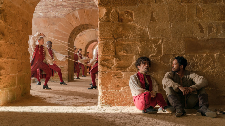 Kelvin Harrison Jr and Peter Dinklage in Cyrano