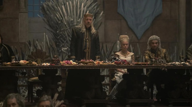 King Viserys and Rhaenyra at the wedding feast in House of the Dragon