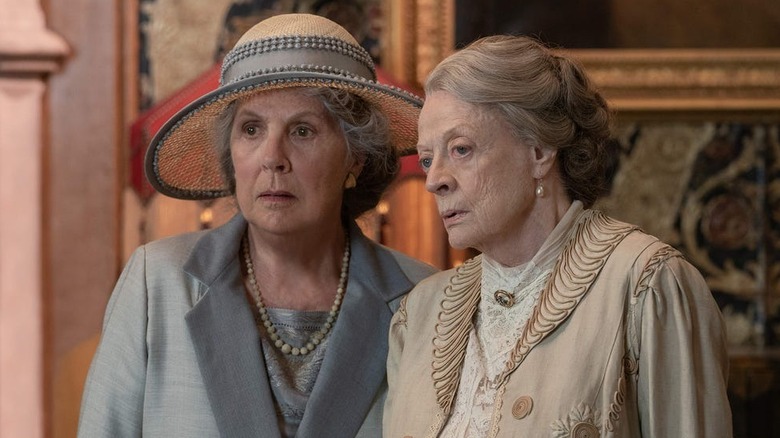 Penelope Wilton and Maggie Smith looking puzzled in Downton Abbey: A New Era