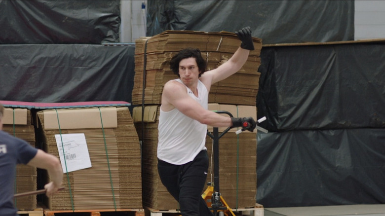 Adam Driver practicing lightsaber choreography