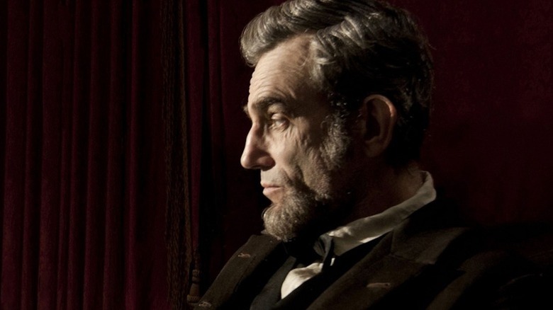 Daniel Day-Lewis shot in profile as Abraham Lincoln in Lincoln