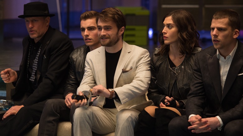 Daniel Radcliffe as Walter Mabry sitting with the Four Horsemen