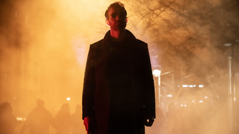 Matt Murdock standing alone in New York City at night in Daredevil: Born Again