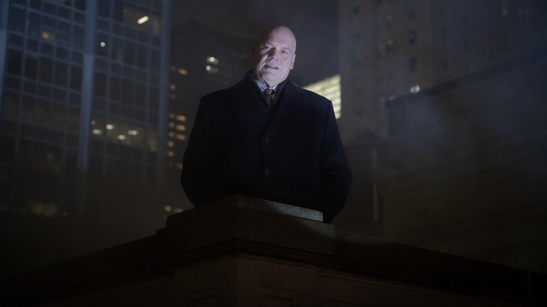 Wilson Fisk looks very uncomfortable from a balcony in Daredevil: Born Again