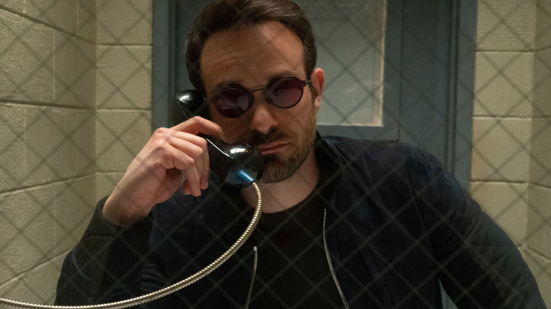 Charlie Cox as Matt Murdock visiting someone in jail in an episode of Daredevil: Born Again