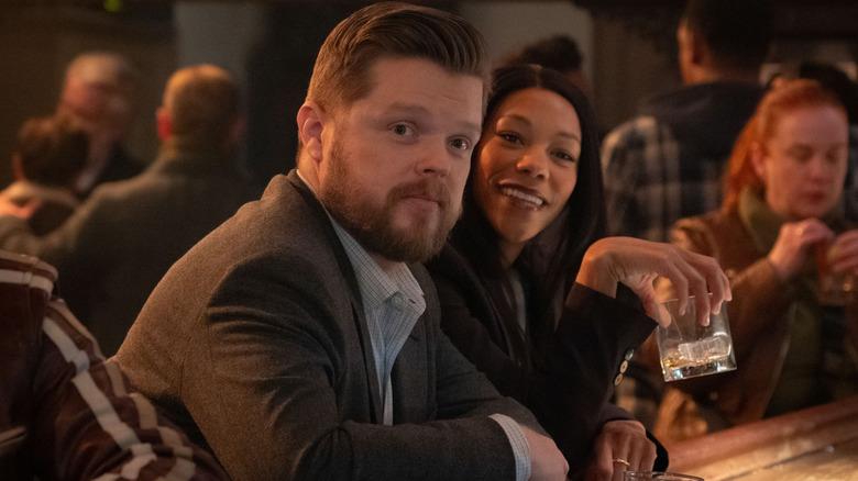 Elden Henson as Foggy Nelson and Nikki M. James as Kirsten Mcduffie ordering drinks at a bar in Daredevil: Born Again