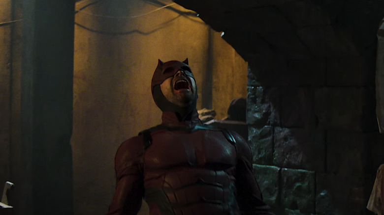 Charlie Cox's Daredevil leans back as he yells in Daredevil Born Again